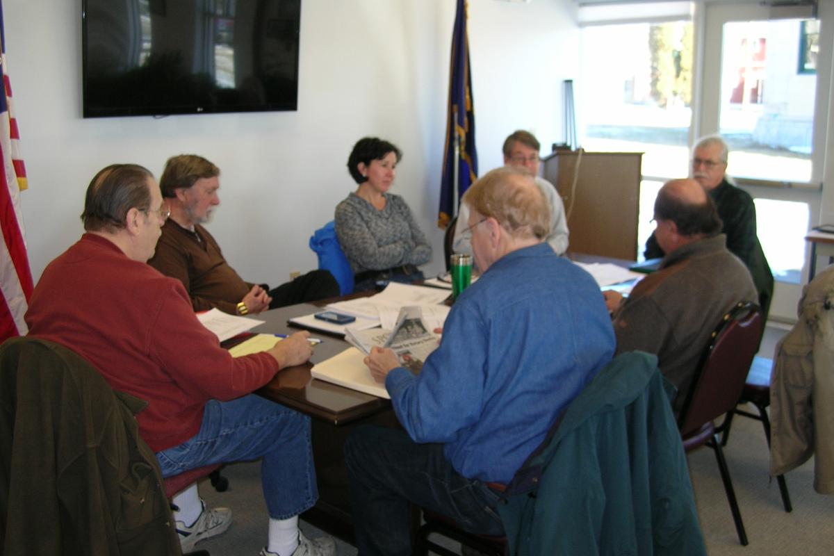 March 5, 2016:  Architects Norm Larson and Chris Williams (far end of table) meet with the Heritage Commission to share their pr