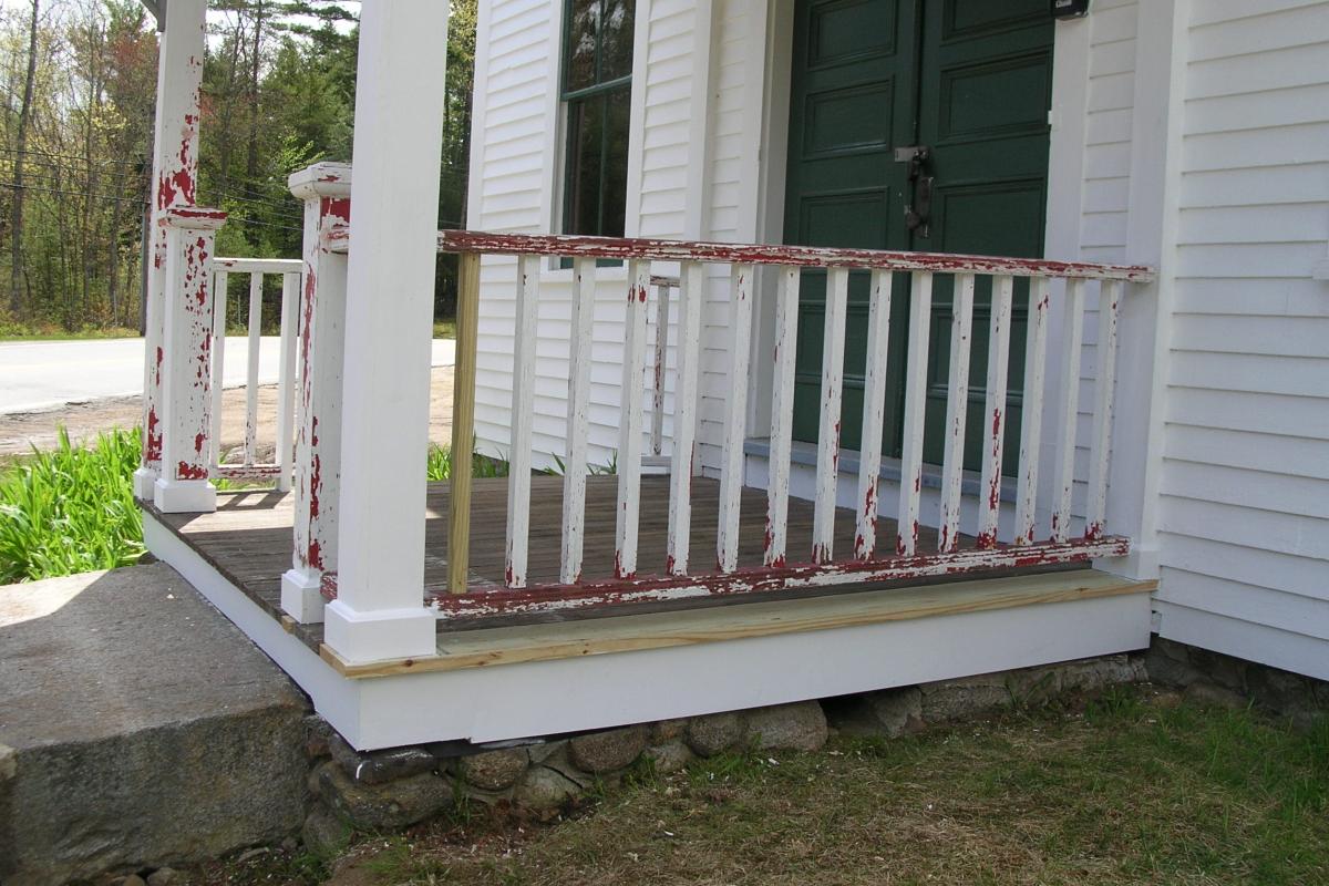 Existing railing needed only 1 baluster replaced before being secured to the building.  New base molding and trim have been installed.
