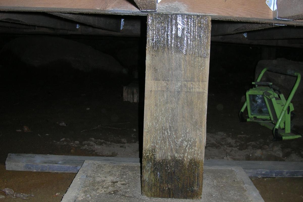 ...And replacing it with this new footing.  Joist hangers are also being installed to help support the floor joists.