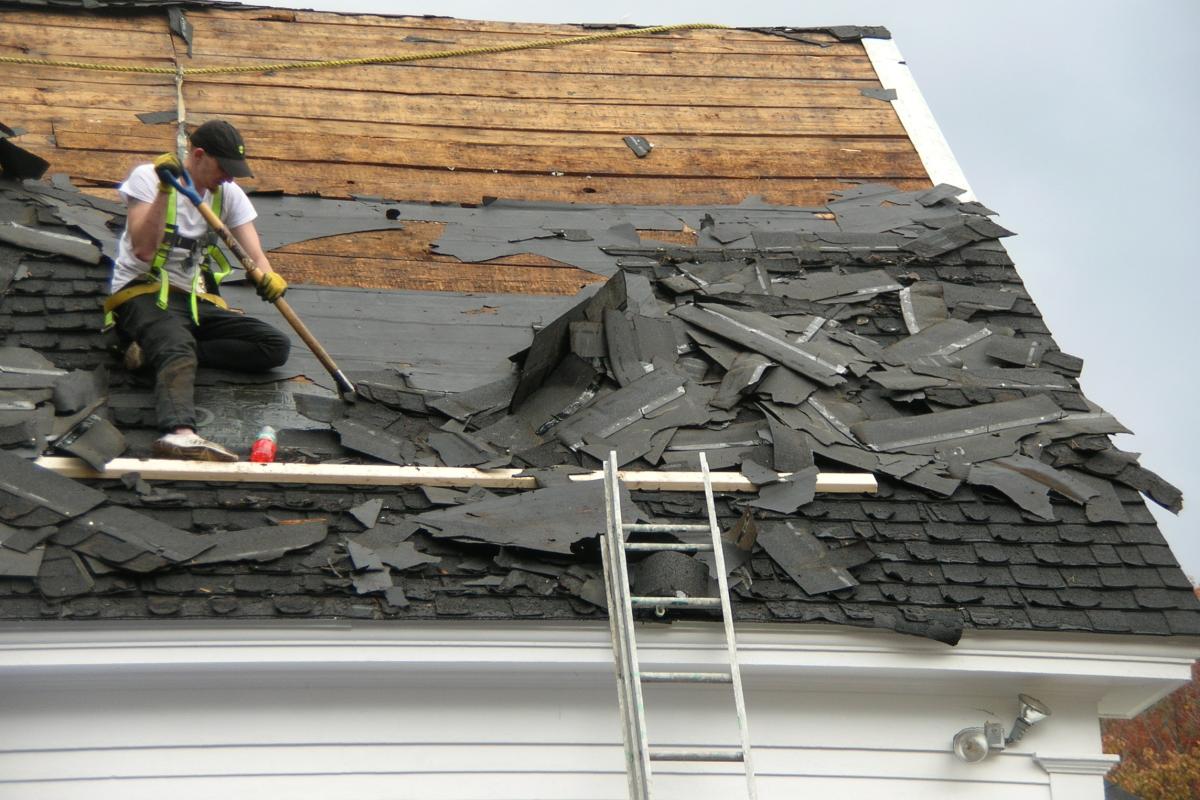 The old shingles that were curling excessively and starting to fail are being removed.