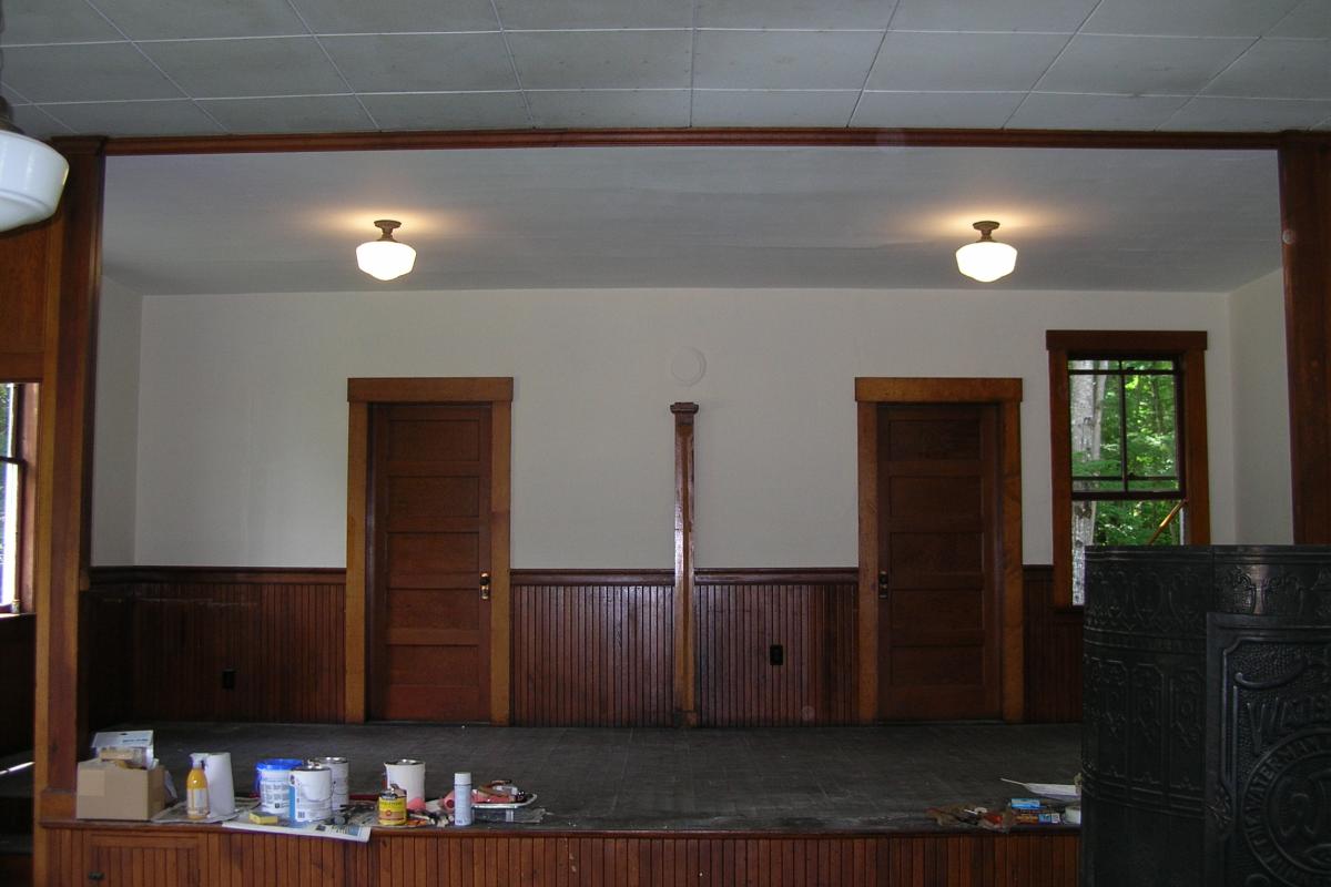 After two coats of paint, the walls and ceiling in the stage area are done.