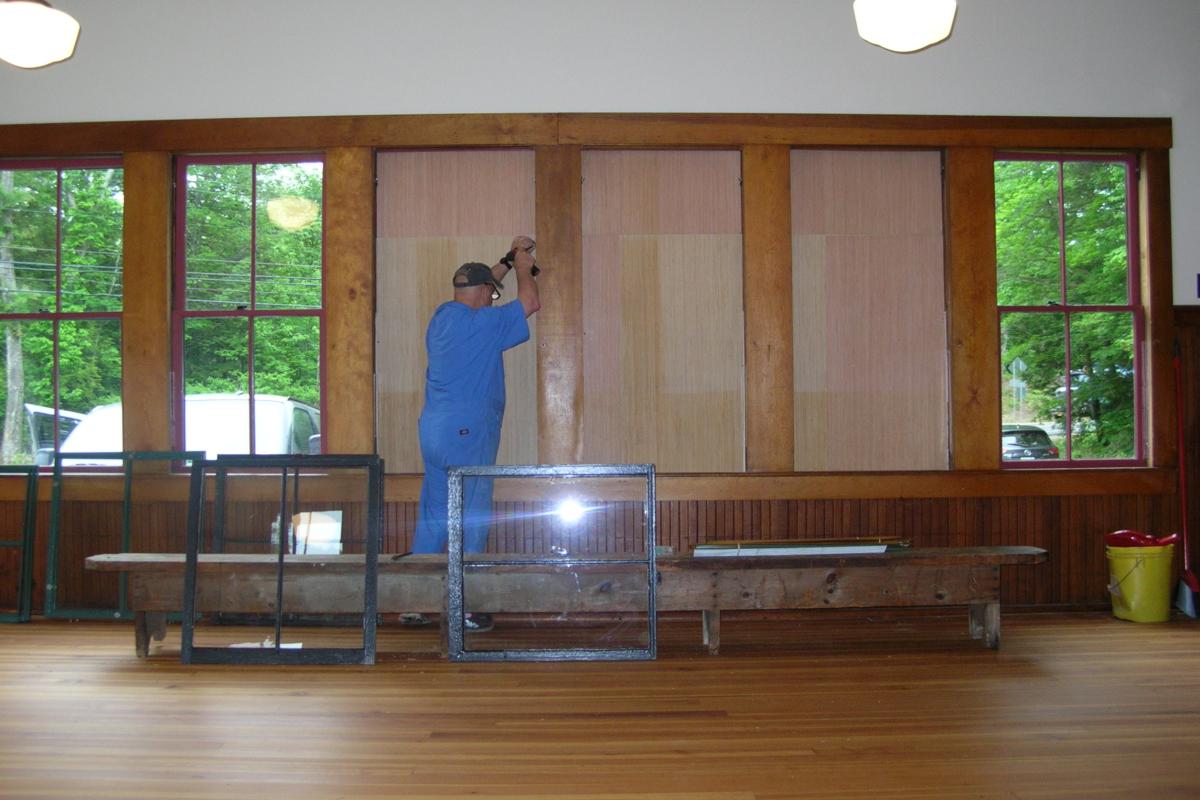 June 11, 2022 - Another view of work being done from the interior.  Plywood is being removed so refurbished sashes can be installed on the south side of the Town House..