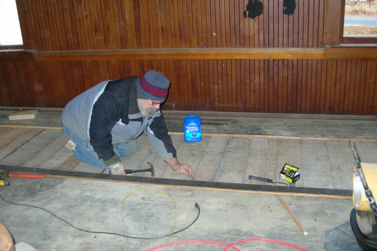 All of the subflooring and floor boards that were removed to gain access for the archaeological study and the foundation work were saved.  Here the subfloor is being reinstalled.